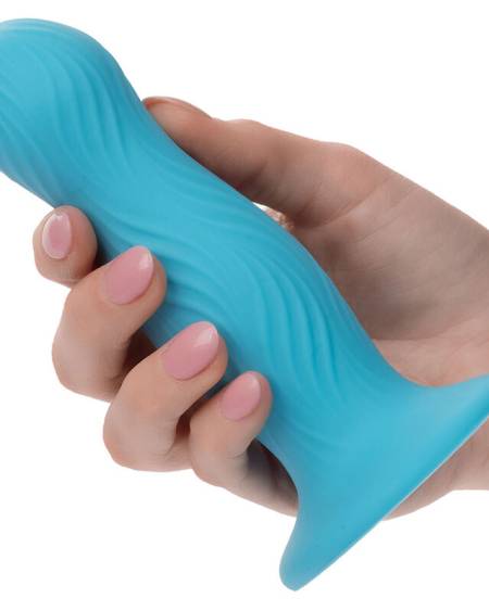Plug anal azul CALEXOTICS Wave Rider Swell com textura ondulada e base de ventosa