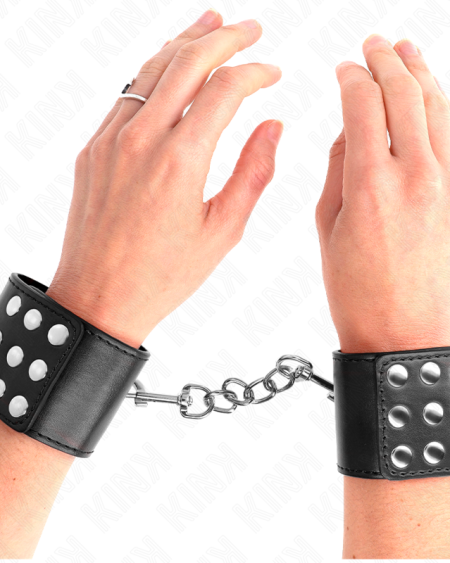 KINK - MUÑEQUERAS CON CIERRE A PRESIÓN AJUSTABLE NEGRO 19-24 CM X 5.5 CM
