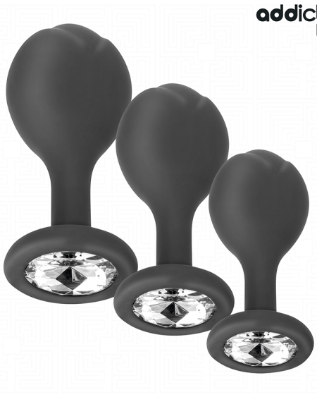 Set ADDICTED TOYS de três plugs anais de silicone com joia, apresentados em tamanhos diferentes.